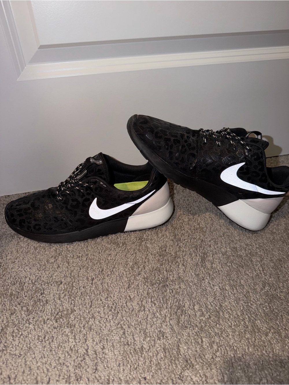 Nike Women's Black Leopard-Print Running Shoes with White Swoosh